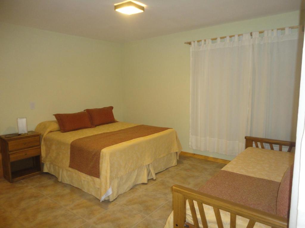 Unquehue Apartamentos Dormis Villa La Angostura Rom bilde